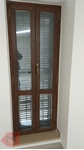 finestra in alluminio finto legno colore noce